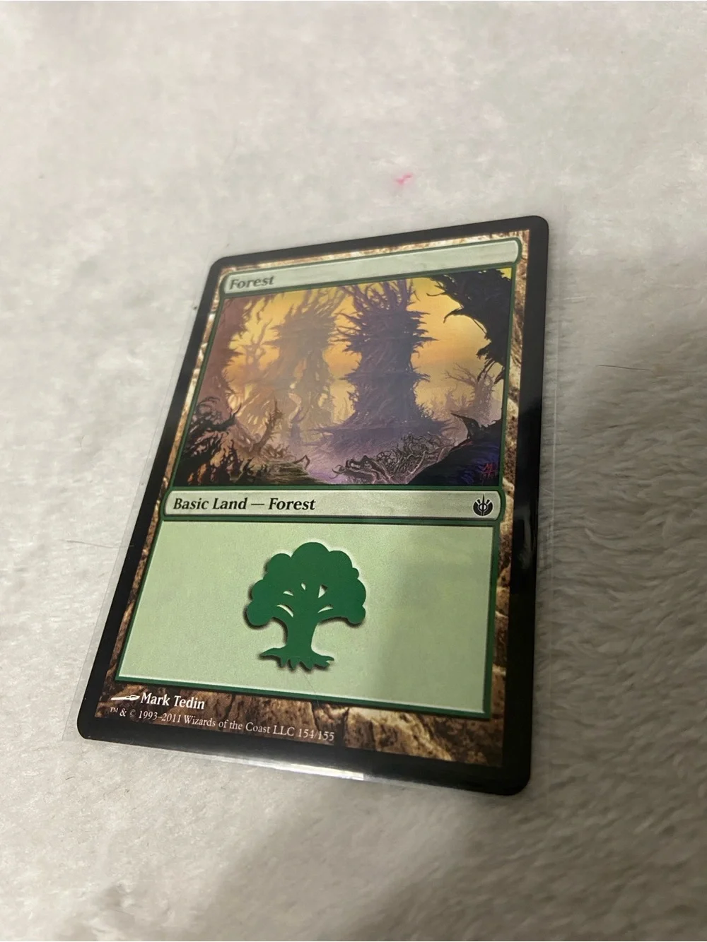 Forest #154/155 Mirrodin Besieged (2011)